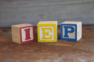 IEP Meeting in wood blocks